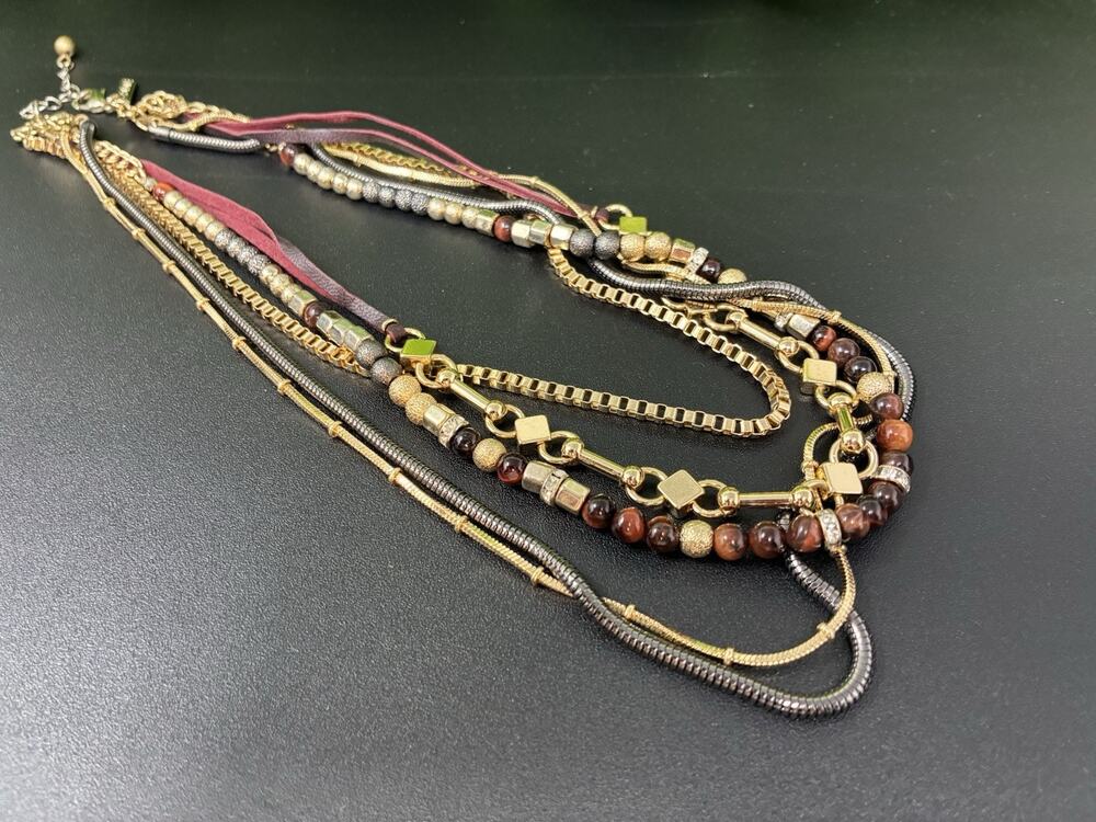 GOLD TONE MULTI strand necklace with various Chain And Natural beads